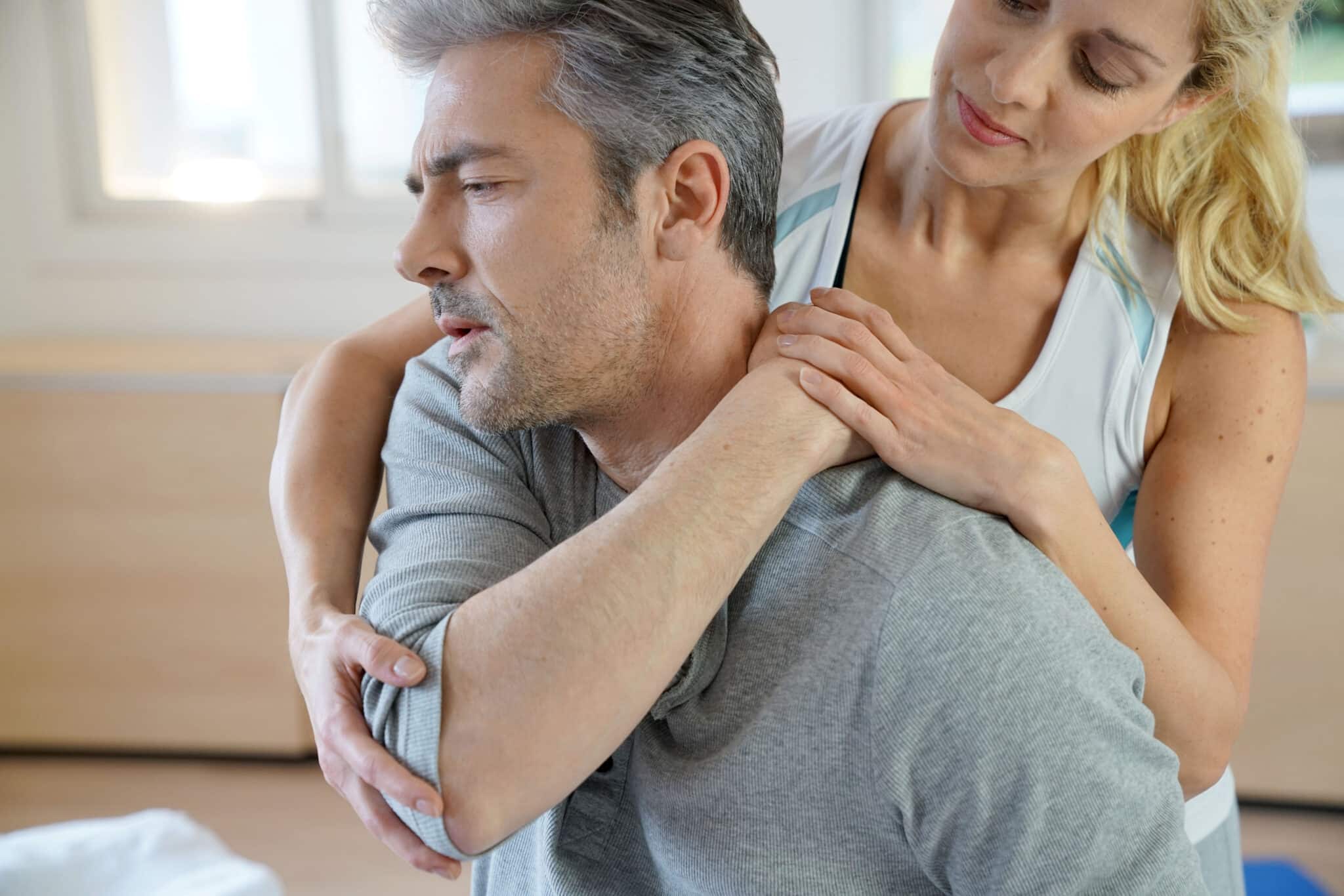 Physiotherapist spine alignment session - Impact Chiropractic